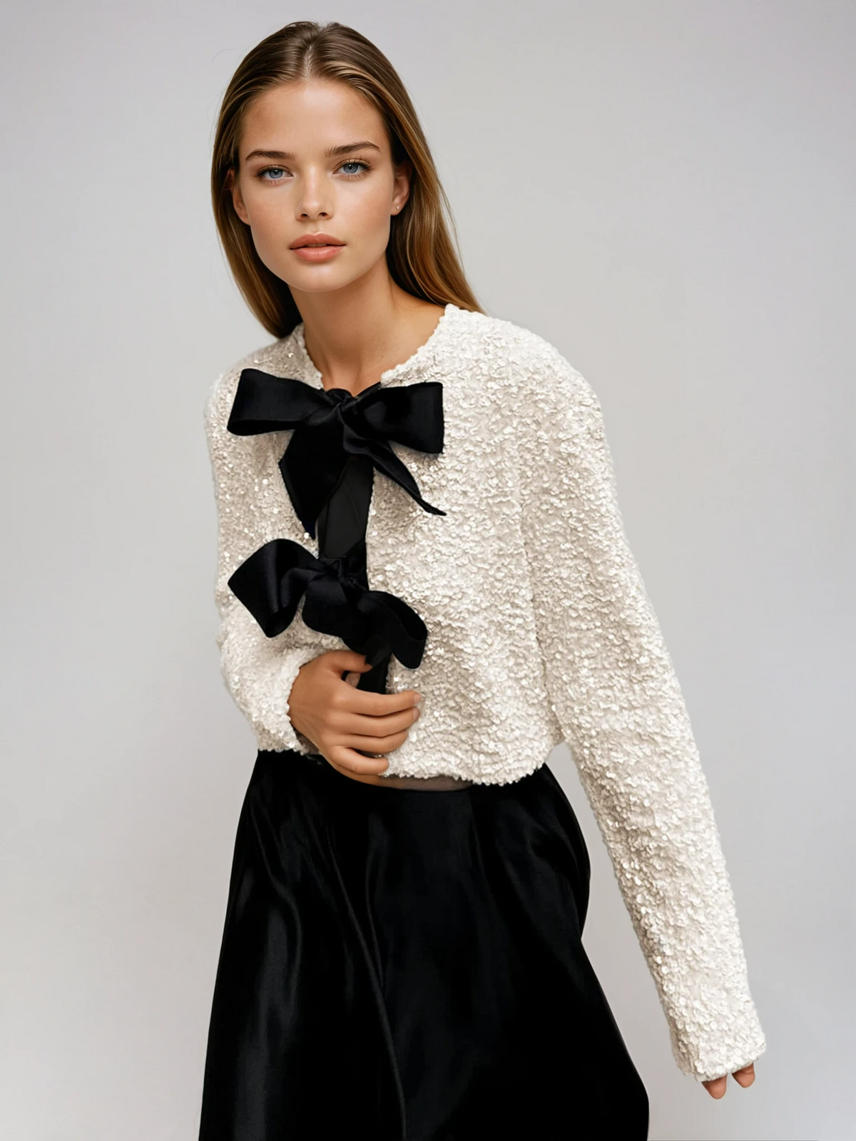 Giacca testurizzata con paillettes e fiocco in velluto - Elora Boutique