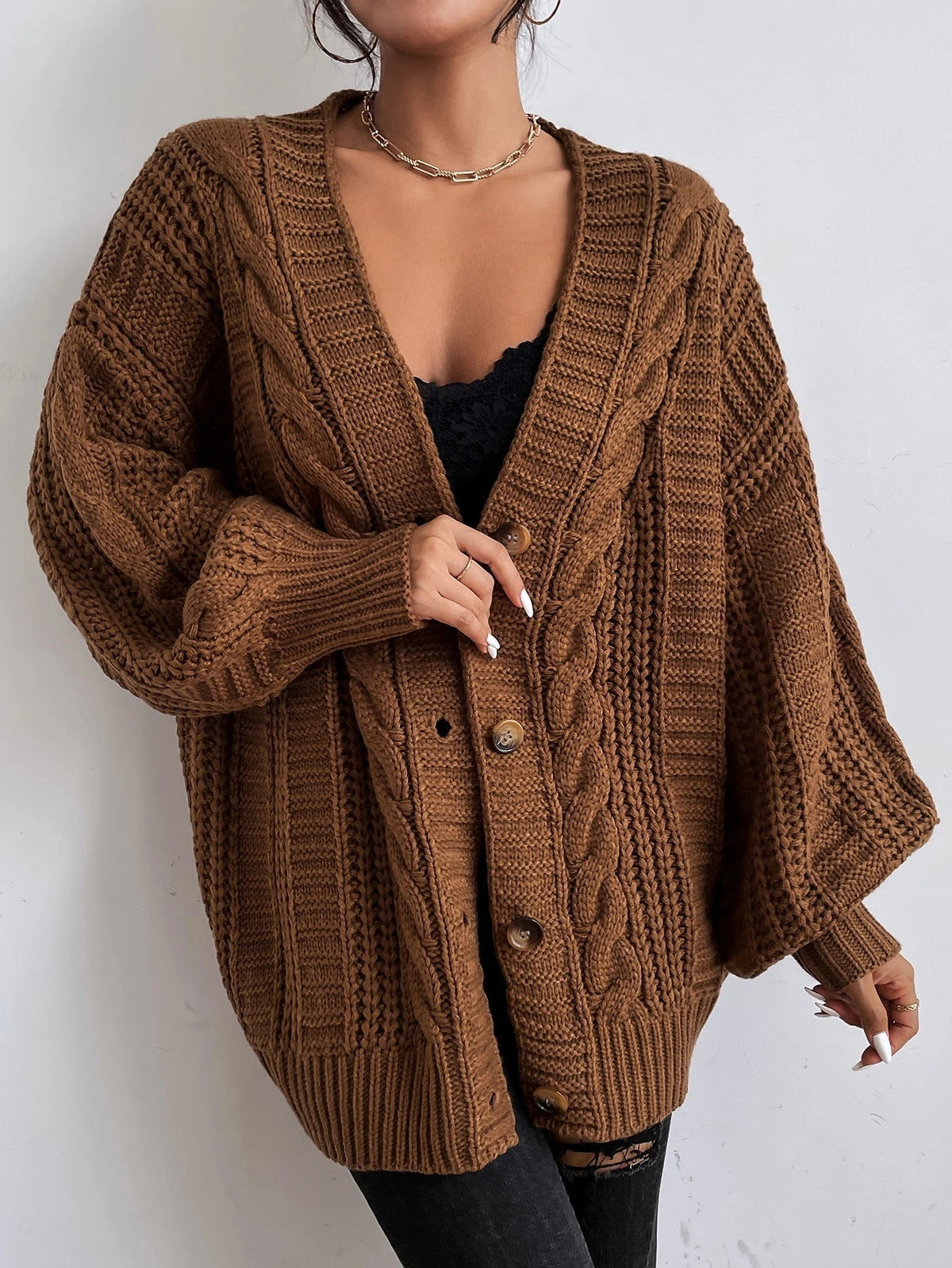 Cardigan oversize a trecce