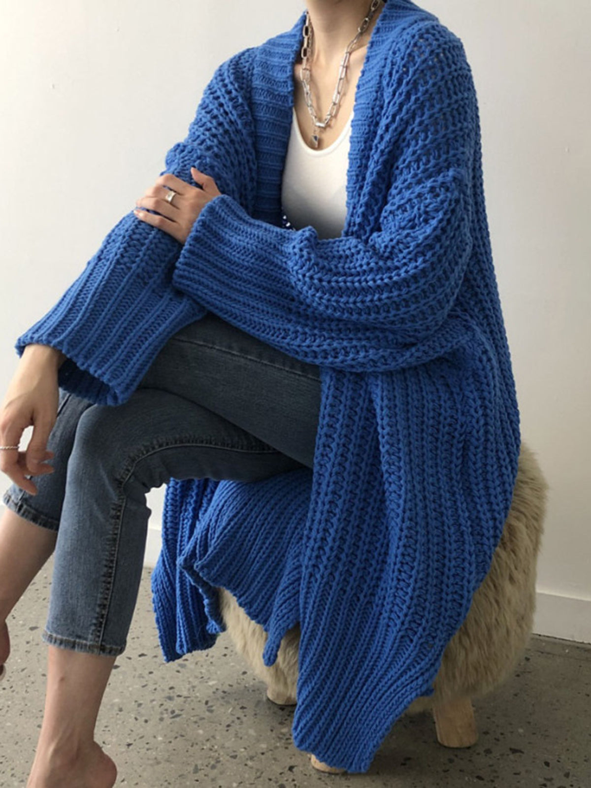 Cardigan oversize in maglia con spacchi