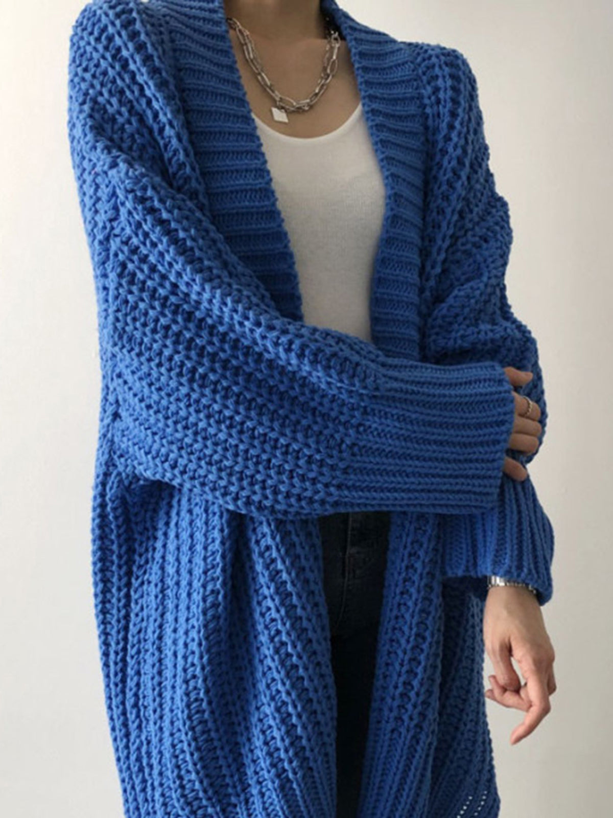 Cardigan oversize in maglia con spacchi