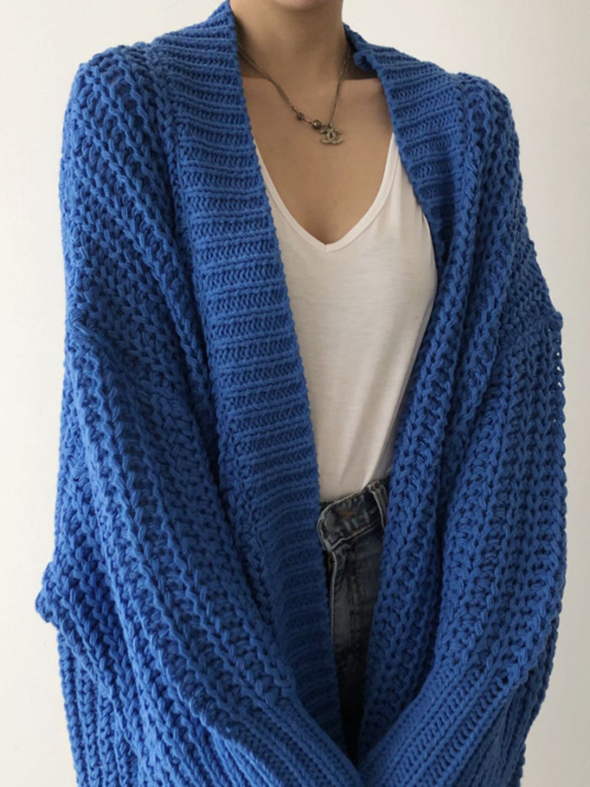Cardigan oversize in maglia con spacchi