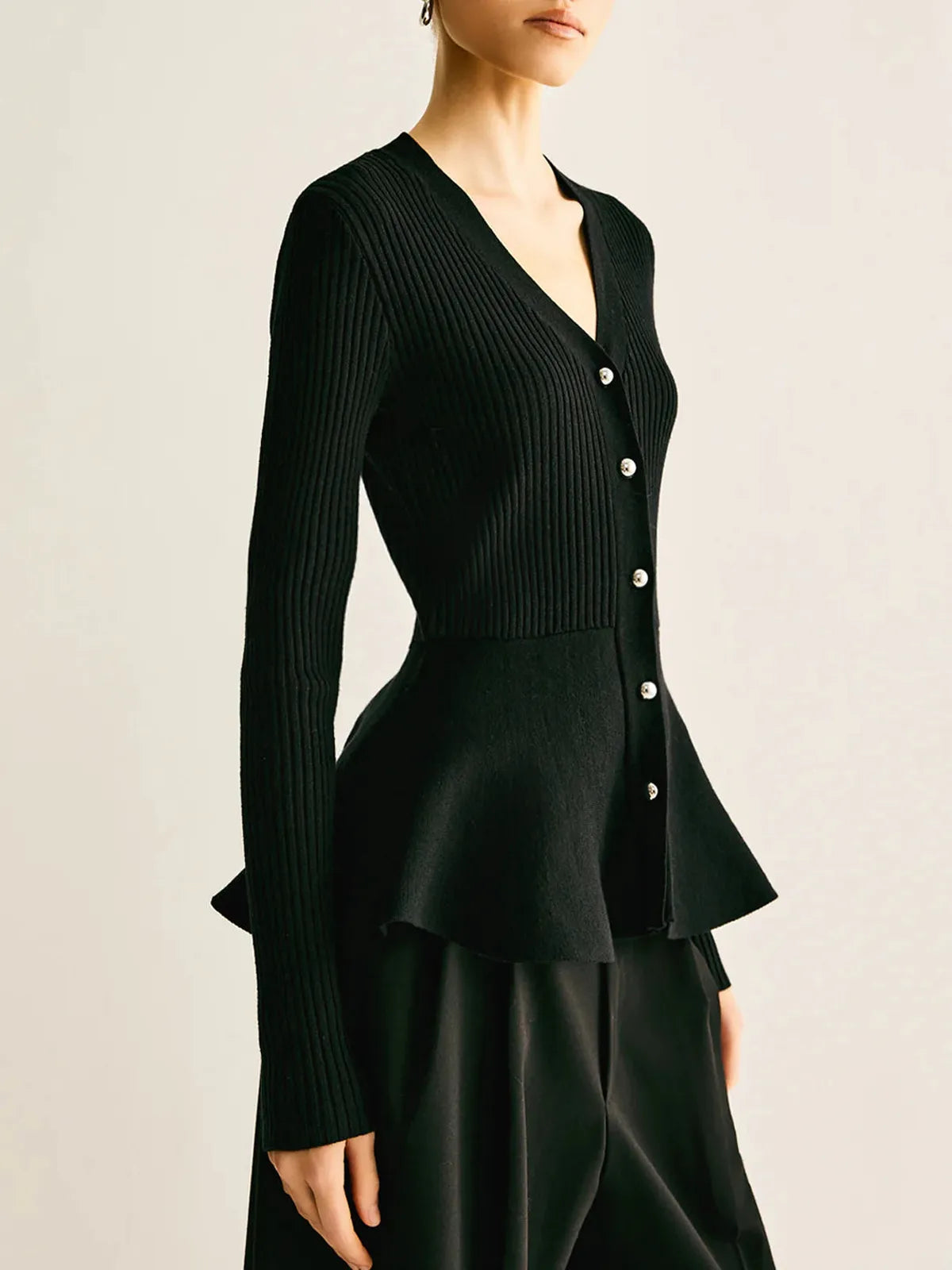 Top peplo a coste in maglia con bottoni - Elora Boutique
