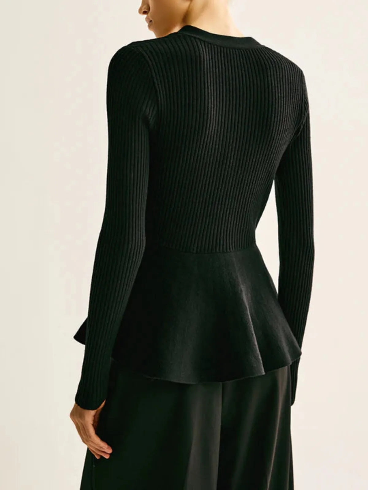 Top peplo a coste in maglia con bottoni - Elora Boutique